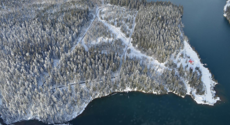 Aerial photo of a maternity pen for caribou on a peninsula in winter