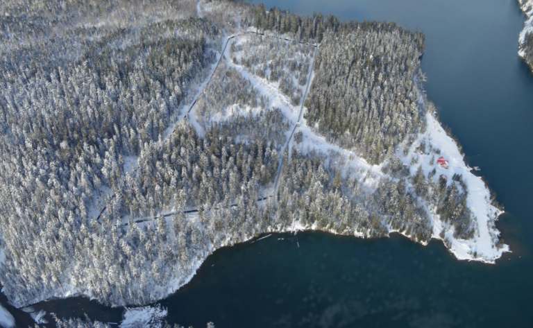 Aerial photo of a maternity pen for caribou on a peninsula in winter